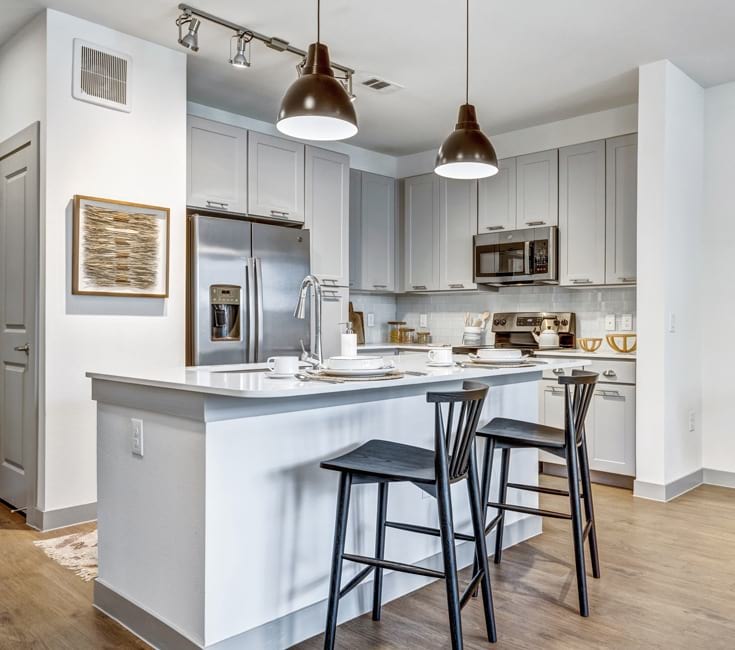 Well-lit kitchen with ample counter space Well-lit kitchen with ample counter space